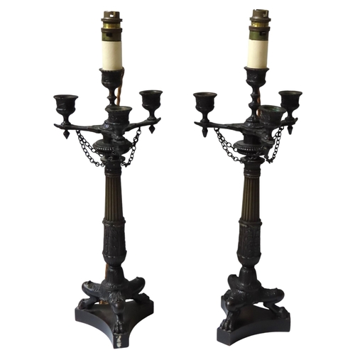 198 - A PAIR OF VINTAGE BRONZE EMPIRE STYLE CANDELABRA, the central sconce surmounting a tripartate platfo... 