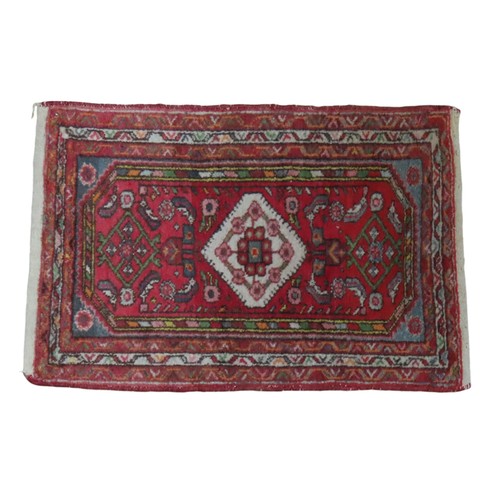 146 - KELIM AND SMALL RED GROUND RUG  Small red ground rug 97cm x 65cm PROVENANCE: From the Collection of ... 