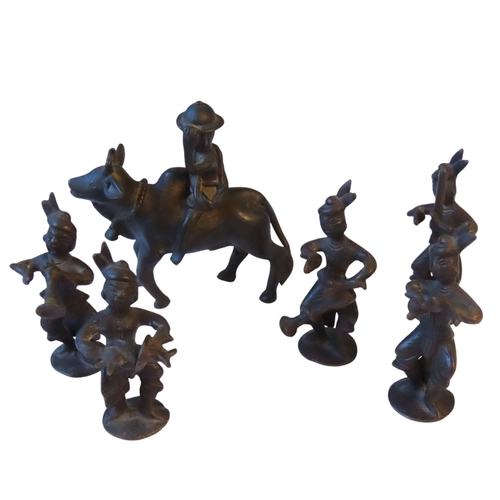 362 - A GROUP OF SIX BURMESE BRONZE FIGURES, the lot comprised of five musicians and a figure astride an o... 