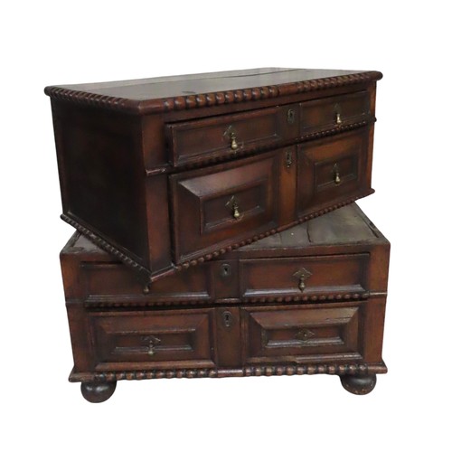 49 - AN OAK PANELLED ATTIC CHEST OF DRAWERS, rectangular top with bobbin turned edge over four alternatin... 