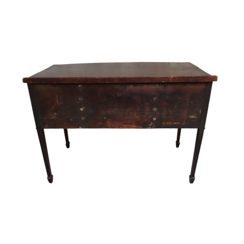 37 - A LATE 19TH CENTURY MAHOGANY WRITING DESK, bow front form, with a long frieze drawer flanked by four... 