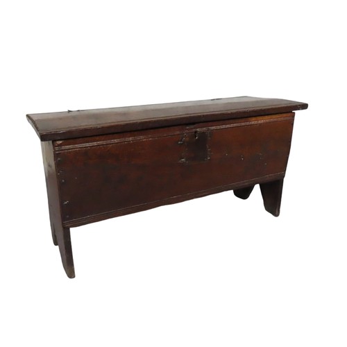 58 - 18TH CENTURY FIVE PLANK OAK COFFER of unusual bow form, rustic appearance with chiselled detail on t... 