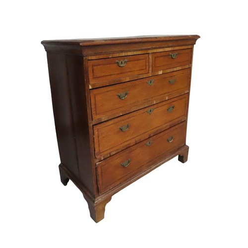 45 - 19TH CENTURY OAK CHEST OF DRAWERS with mahogany cross banding. 2 small drawers over three graduated ... 