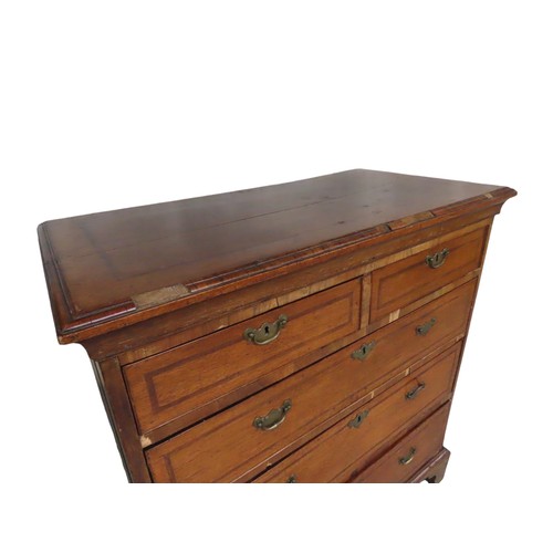 45 - 19TH CENTURY OAK CHEST OF DRAWERS with mahogany cross banding. 2 small drawers over three graduated ... 