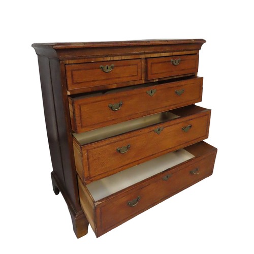 45 - 19TH CENTURY OAK CHEST OF DRAWERS with mahogany cross banding. 2 small drawers over three graduated ... 