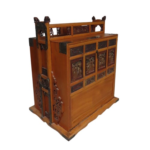 107 - SOUTH EAST ASIAN SWORD CHEST with metalwork panels of figures, three shelves and elephant shaped fin... 