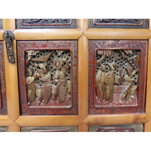 107 - SOUTH EAST ASIAN SWORD CHEST with metalwork panels of figures, three shelves and elephant shaped fin... 