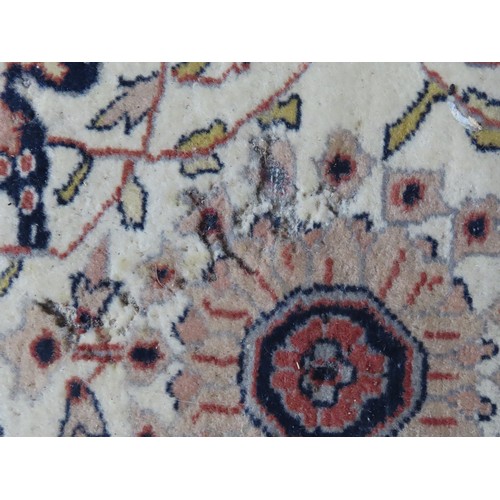 147 - TWO WOOL RUGS consisting of one with a cafe au lait border and cream ground centre, with damage (156... 