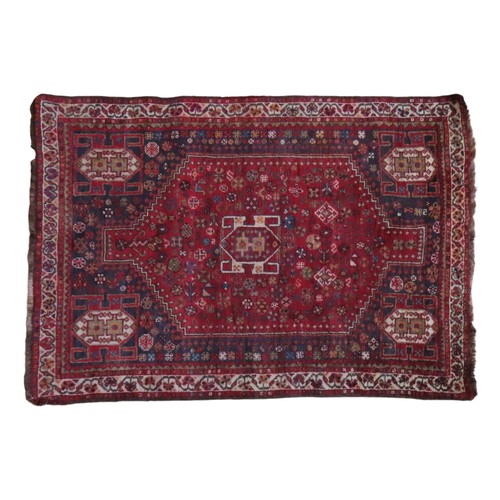 153 - NAVY AND BROWN BORDERED WOOL RUG AND SMALLER RED WOOL RUG Navy and brown deep bordered rug with cent... 