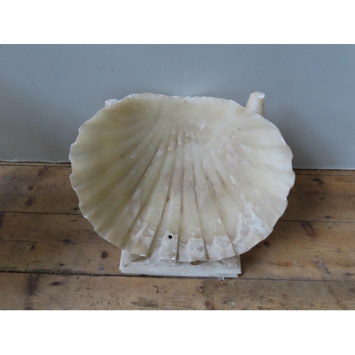 593 - A CARVED ALABASTER NEO-CLASSICAL STYLE FOUNTAIN, modelled as a open clam shell supported by opposing... 