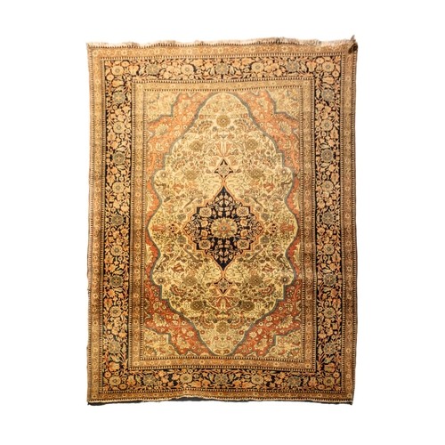 156 - A HAND KNOTTED PERSIAN WOOL RUG, LATE 19TH / EARLY 20TH CENTURY, probably Kashan, slightly faded and... 