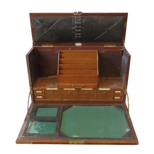 214 - AN EDWARDIAN OAK CAMPAIGN STYLE CLERK'S BOX, bearing a presentation plaque to the top and brass inse... 