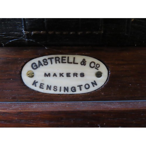 214 - AN EDWARDIAN OAK CAMPAIGN STYLE CLERK'S BOX, bearing a presentation plaque to the top and brass inse... 