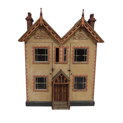 434 - AN EDWARDIAN DOLL'S HOUSE with bi-fold front, opening to reveal four rooms each with a fireplace, in... 