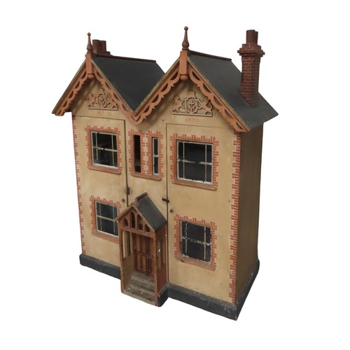 434 - AN EDWARDIAN DOLL'S HOUSE with bi-fold front, opening to reveal four rooms each with a fireplace, in... 