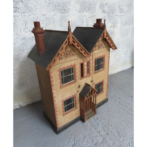 434 - AN EDWARDIAN DOLL'S HOUSE with bi-fold front, opening to reveal four rooms each with a fireplace, in... 