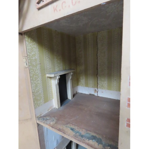 434 - AN EDWARDIAN DOLL'S HOUSE with bi-fold front, opening to reveal four rooms each with a fireplace, in... 