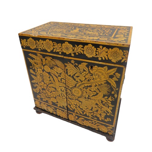 217 - A REGENCY PENWORK TABLE TOP CABINET, the hinged top decorated with a white hart and hounds reserved ... 