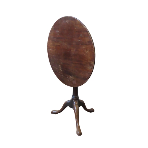 57 - A GEORGE III MAHOGANY BIRDCAGE TRIPOD TABLE, the circular top raised on a turned column, on three ou... 