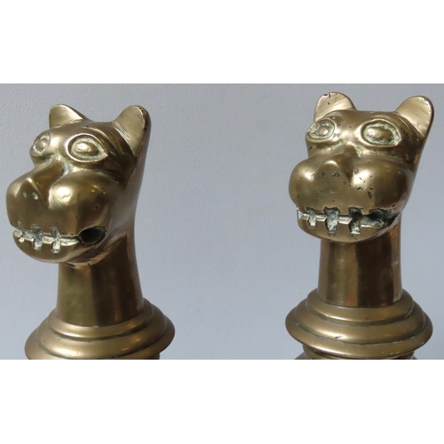 575 - A PAIR OF 19TH CENTURY LACQUERED BRONZE ZOOMORPHIC DOOR PORTERS, the knopped baluster stems surmount... 