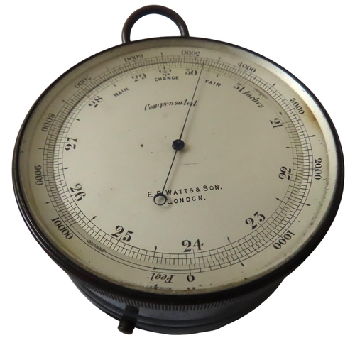 261 - A DUAL BAROMETER AND COMPASS BY E.B. WATTS AND SON, LONDON, opposing each other in a circular black ... 