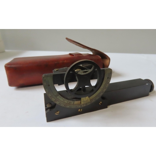 264 - A POCKET INCLINOMETER, EARLY 20TH CENTURY, in anodised brass with 90 degree vernier scale, and spiri... 