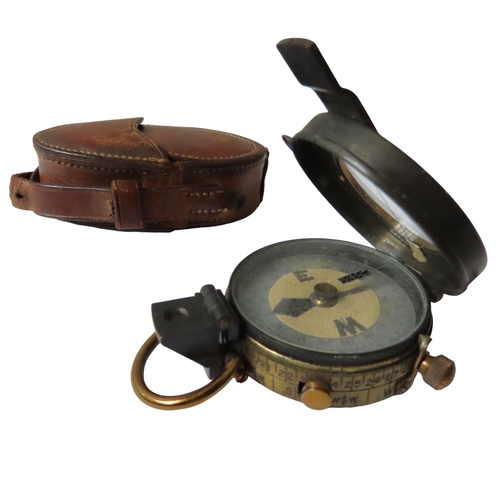 273 - A VERNER’S PATTERN MK V, MILITRAY ISSUE PRISMATIC COMPASS in a leather case by W. Watson & Sons,... 