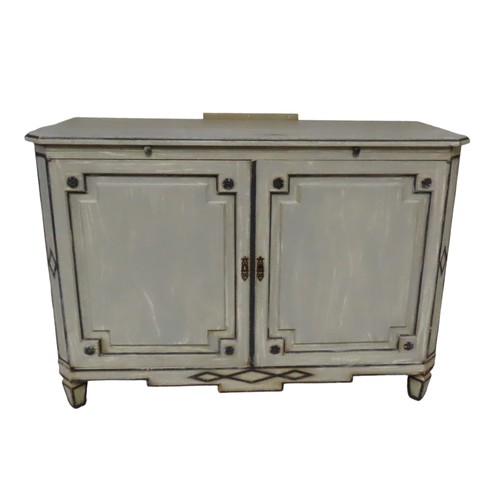 34 - A FRENCH TWO DOOR SIDE CUPBOARD, rectangular top with canted corners over a brushing slide, the twin... 