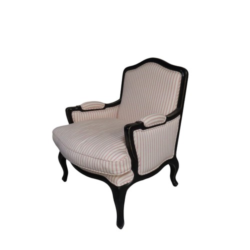 73 - CONTEMPORARY CONTINENTAL STYLE ARMCHAIR, with ebonised style frame and pale pink ticking stripe upho... 