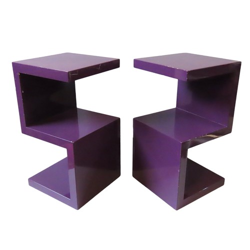 78 - A PAIR OF PURPLE ACRYLIC S-SHAPED SIDE TABLESwith reflective gloss finish59.5cm high x 32cm x 32cm... 