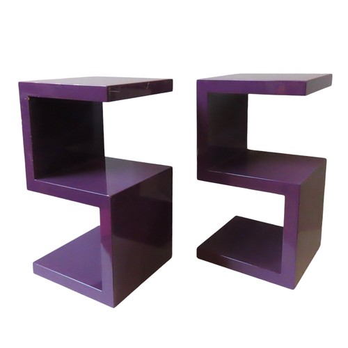 78 - A PAIR OF PURPLE ACRYLIC S-SHAPED SIDE TABLESwith reflective gloss finish59.5cm high x 32cm x 32cm... 