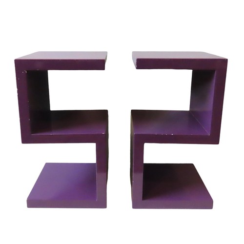 78 - A PAIR OF PURPLE ACRYLIC S-SHAPED SIDE TABLESwith reflective gloss finish59.5cm high x 32cm x 32cm... 