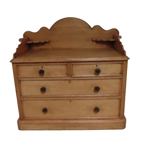 46 - A 19TH CENTURY PINE CHEST OF FOUR DRAWERS, with a scrolling three quarter galleried top over two sho... 