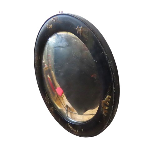 205 - SMALL ROUND CHINOISERIE MIRROR with black japanned frame and details of figures and templesdiameter ... 