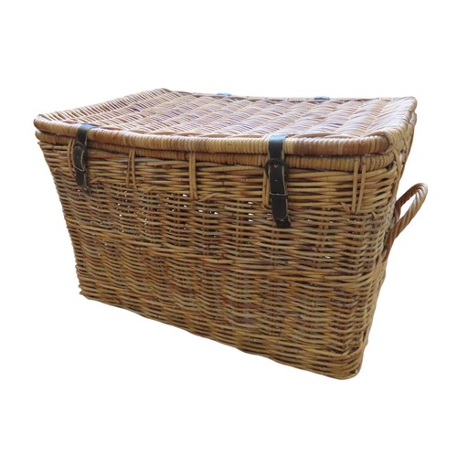 560 - WICKER LAUNDRY HAMPERwith leather hinges and straps, two buckle fastenings and two wicker side handl... 