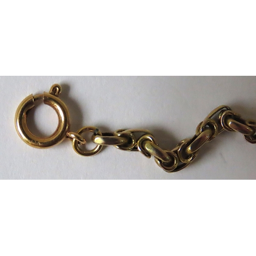 614 - A 9CT GOLD BELCHER CHAIN AND THREE YELLOW METAL CHAINS, the belcher chain measuring 30 cm long and w... 