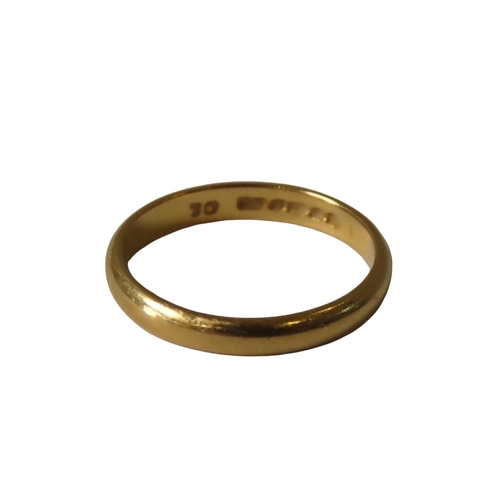 609 - A 22 CT GOLD BAND RING, with domed shank3.6 grams