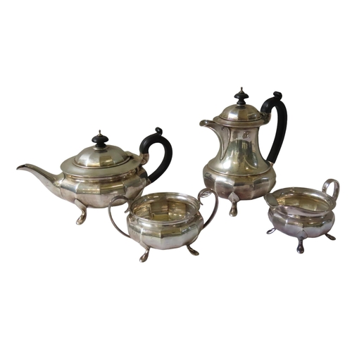 705 - A VINTAGE SILVER FOUR PIECE TEA SERVICE, comprised of a teapot, coffee pot, milk jug and sugar bowl,... 