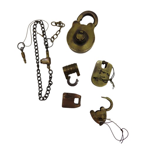 574 - A GROUP OF SIX VINTAGE BRASS LOCKS, the lot includes an unusual 19th Century letter combination lock... 