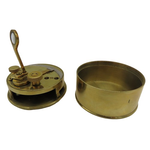 257 - A BRASS POCKET SEXTANT, of typical cylindrical drum form, with screw top case4 cm high x 7.5 cm diam... 