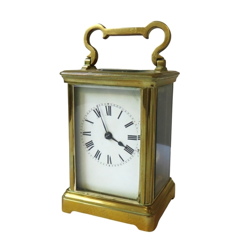 187 - A STRIKING CARRIAGE CLOCK, white enamel dial, replaced lever platform, in brass case, winding key, 1... 