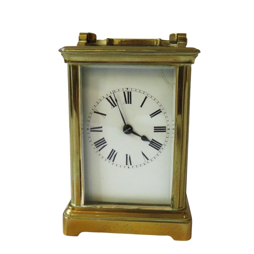 187 - A STRIKING CARRIAGE CLOCK, white enamel dial, replaced lever platform, in brass case, winding key, 1... 