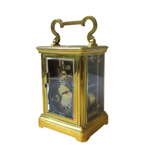 187 - A STRIKING CARRIAGE CLOCK, white enamel dial, replaced lever platform, in brass case, winding key, 1... 