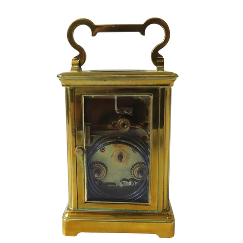 187 - A STRIKING CARRIAGE CLOCK, white enamel dial, replaced lever platform, in brass case, winding key, 1... 