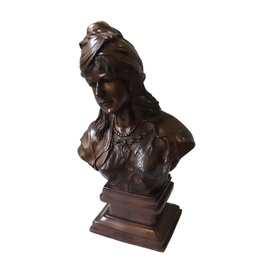 589 - IN THE MANNER OF EMMANUEL VILLANIS, A 20TH CENTURY BRONZE BUST FIGURE, depicting a gypsy girl wearin... 