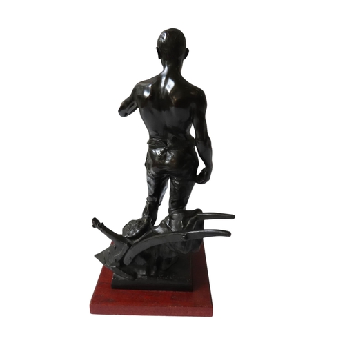 594 - FERDINAND LUGERTH (1885-1915) BRONZE FIGURE OF FARM WORKER, modelled standing in front of a plough, ... 