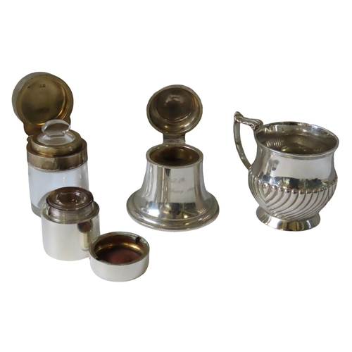 649 - A GADROONED SILVER MUG AND AN INKWELL IN THE FORM OF A BELL, together with a travelling inkwell and ... 