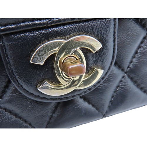 286 - CHANEL BLACK LEATHER QUILTED FLAP BAG with authentication card and Chanel dust bag.Main compartment ... 