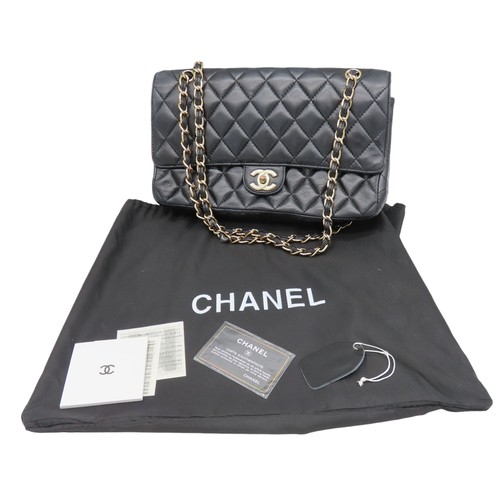 286 - CHANEL BLACK LEATHER QUILTED FLAP BAG with authentication card and Chanel dust bag.Main compartment ... 