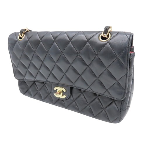 286 - CHANEL BLACK LEATHER QUILTED FLAP BAG with authentication card and Chanel dust bag.Main compartment ... 